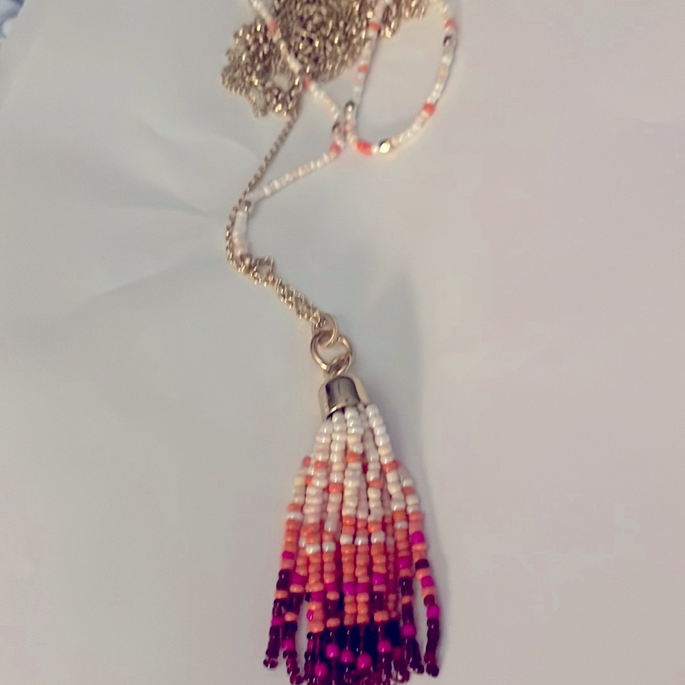 Goldtone long tassel necklace